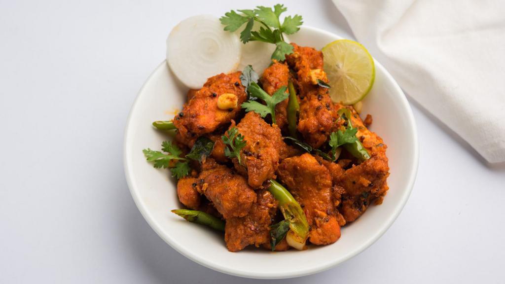 Chicken 65 · Marinated chicken thigh prepared with curry leaves and savory yogurt.