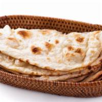 Butter Naan · Oven baked flatbread.