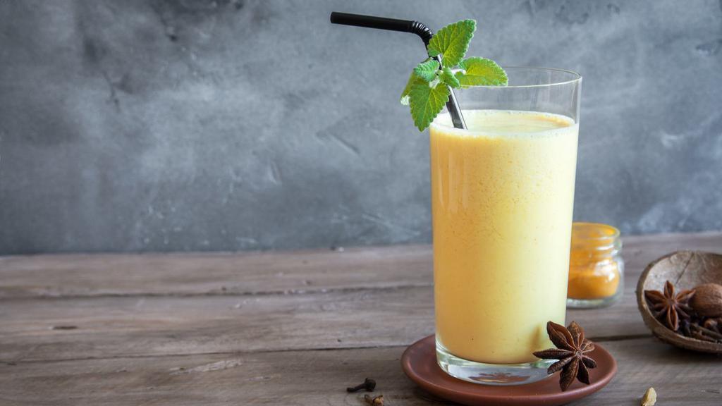Mango Lassi · Yogurt based drink with mangoes and all natural flavors. gluten-free.