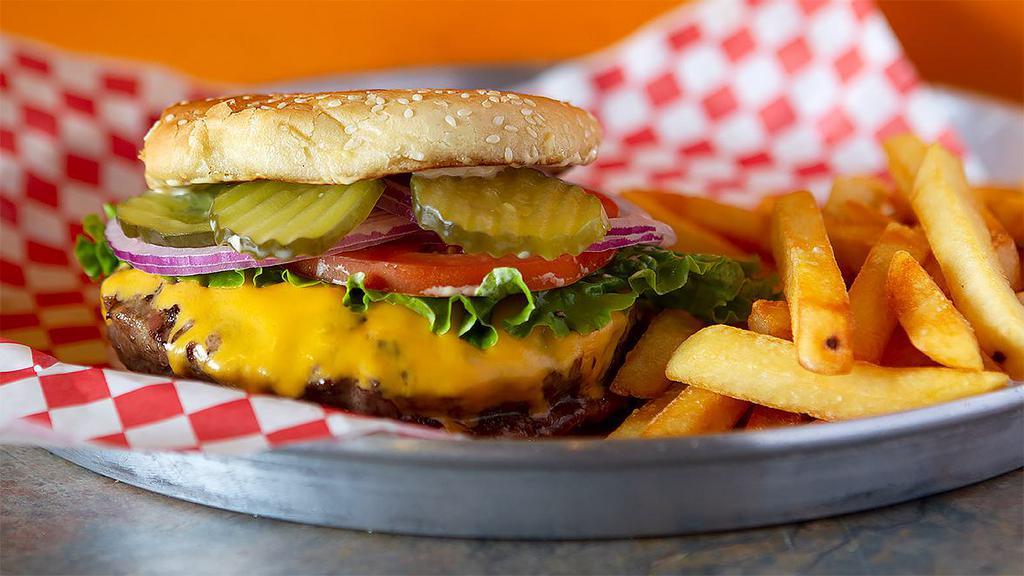 The Buzzer Beater Burger · Most popular. Classic cheeseburgers. Half pound ground beef burgers. Served with tomato, lettuce, pickles, onions, house sauce, and french fries on a sesame seed bun.