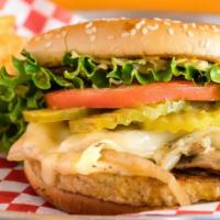 The Mean Joe Green Burger · Veggie burger topped with Swiss, mushrooms, and sauteed onions. Served with tomato, lettuce,...