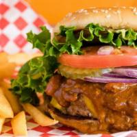 The Chili Davis Burger · Cheeseburger topped with chili. Half pound ground beef burgers. Served with tomato, lettuce,...