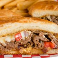 The 76er Sandwich · Philly cheese steak served with sautéed onions, bell peppers, french fries, and topped with ...