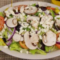 Greek Salad · Romaine lettuce, tomato, red onion, black olives, pepperoni, bell peppers, mushrooms, and fe...