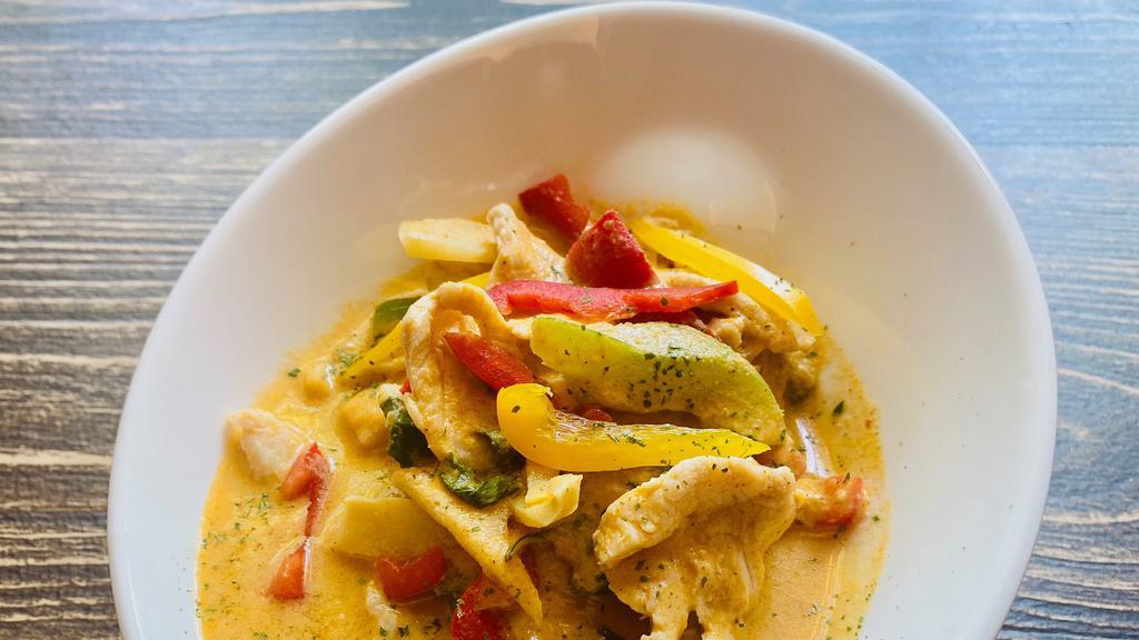 Yellow Curry · Potato, carrot, onion, and tomato in yellow coconut curry