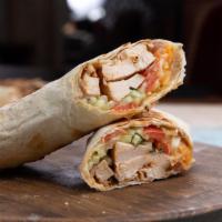 Chicken Shawarma & Gyro Wrap · Warm wrap with freshly sliced chicken shawarma, gyro meat, lettuce, tomatoes, diced onions, ...