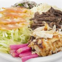 Classic Combo Platter · Exquisite combo mix of both chicken shawarma and gyro meat, served on bed of steamed rice, h...