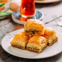Baklava · Crispy wafers topped with nuts and honey syrup.