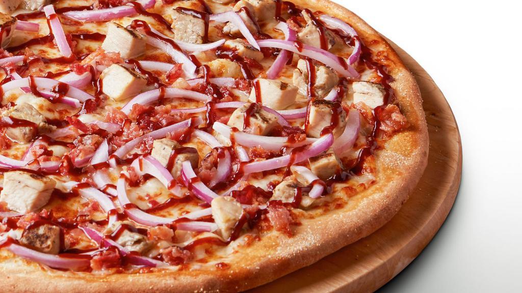 Texas Bbq - Large · Hot and spicy barbeque sauce on our original crust, topped with mozzarella cheese, all-natural grilled chicken, smoked bacon, and red onions.