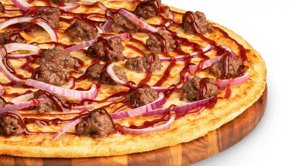 Impossible™️ Beef Bbq - Large · Tuscany thin crust, 100% whole milk mozzarella, sliced red onions, Impossible™️ beef, and drizzled with Cattlemens®️ spicy BBQ sauce.