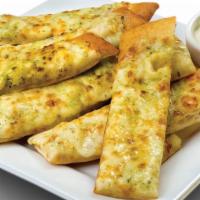 Cheezee Pesto Bread - Large · Creamy pesto garlic sauce, topped with mozzarella cheese. Served with ranch sauce.