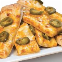 Cheezee Jalapeño Bread - Large · Signature creamy garlic sauce, topped with mozzarella cheese, cheddar cheese, and jalapeños....