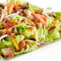 Chicken Bacon Ranch · Iceberg lettuce, bacon, all-natural grilled chicken, bell peppers, red onions, black olives,...