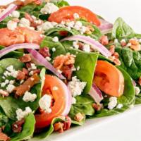 Spinach Tomato Salad · Fresh baby spinach, fresh sliced tomatoes, sliced red onions, applewood smoked wood bacon, c...