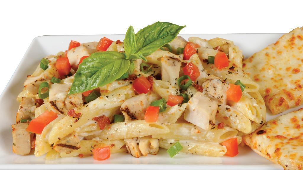 Penne Pollo Rustico · Penne rigati, all-natural grilled chicken, smoked bacon, green onions, and tomatoes, all tossed in our creamy garlic sauce and topped with mozzarella and fresh basil.
