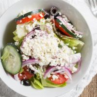 Greek Salad · Lettuce, tomatoes, onions, cucumber, olives, and Feta cheese.