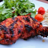 Chicken Tikka Leg · Bone-in chicken breast marinated in ginger, garlic, herbs, and spices.