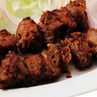 Beef Boti Kebab · Boneless beef cubes marinated in ginger, garlic, herbs, and spices