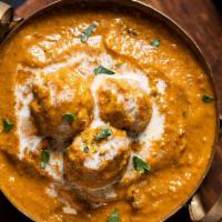 Chicken Kofta · Classic chicken meatballs curry with ginger, garlic, onions, and spices.