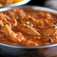 Murgh Masala · Traditional chicken curry in exotic spices.