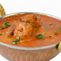 ​Lamb Tikka Masala · Traditional lamb curry in exotic spices.