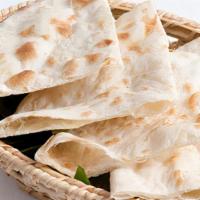 Plain Naan · Plain naan with a brush of butter.
