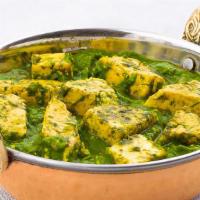 Palak Paneer · Cubes of homemade farmer’s cheese sautéed with fresh spinach and fenugreek.