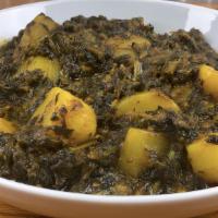 Palak Aloo · Fresh spinach and potatoes cooked with onion, ginger, and garlic.