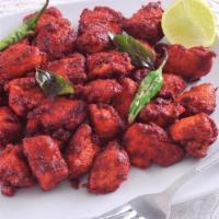 Chicken 65 · Chicken marinated with Indian spices and deep-fried.