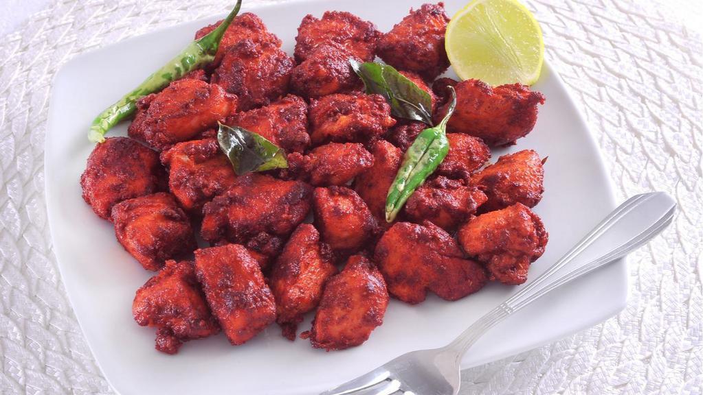 Chicken 65 · Chicken marinated with Indian spices and deep-fried.