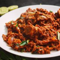 Mutton Sukka · Goat meat with bone cooked or pan fried with spices