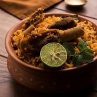 Shahi Gosht Biryani(weekend dinner only) · Tender goat meat marinated with spices and herbs, cooked with basmati rice