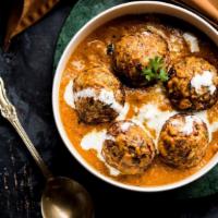 Malai Kofta (3 pcs) · Vegetables and cheese dumplings cooked in mildly spiced sauce.