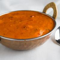 Chicken Tikka Masala · Very popular white chicken cooked then simmered in a delicious creamy tomato sauce, served w...