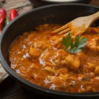 Chicken Curry · Boneless chicken cooked with Indian spices.