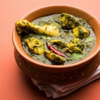 Chicken Saag · Chicken cooked with spinach purée, herbs and spices.