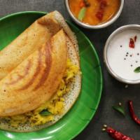 Masala Dosa · Thin crispy crepe made with rice and lentil batter, filled with potato curry.