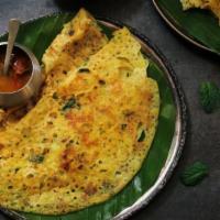 Onion Chili Rava Dosa · Thin crispy crepe made with wheat cream and rice flour with a touch onion and chili.