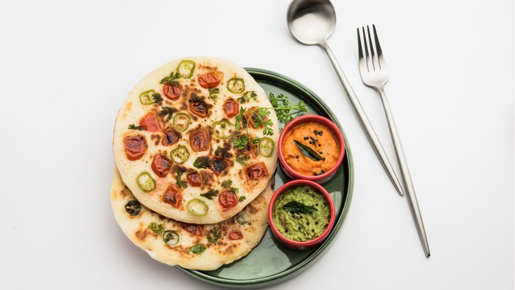 Custom Uttapam (2 Toppings) · Choose your own toppings for the puffy Indian pancake.