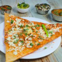 Chili Cheese Dosa · A crispy crepe topped with grated Cheddar cheese and green chilies.