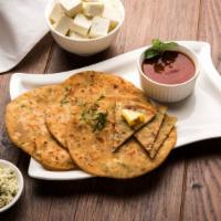 Paneer Kulcha (2 pcs) · Naan stuffed with Indian cottage cheese and spices.