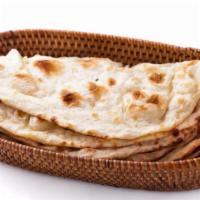 Plain Naan (2 pcs) · Indian bread made with all-purpose flour baked in clay oven.