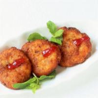 Aloo Tikki (4 Pieces) · Aloo tikki are mashed potato patties mixed with coriander, peas, and spices, deep fried in o...