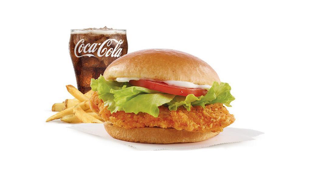 Spicy Chicken Sandwich Combo · A juicy chicken breast marinated and breaded in our unique, fiery blend of peppers and spices to deliver more flavor inside and out, cooled down with crisp lettuce, tomato, and mayo. It’s the original spicy chicken sandwich, and the one you crave