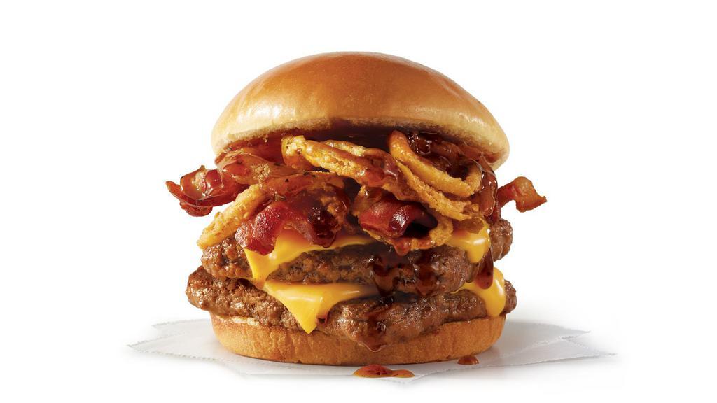 Bourbon Bacon Cheeseburger Double · A half-pound* of fresh, never-frozen beef topped with Applewood smoked bacon, American cheese, crispy onions, and a sweet, smoky bourbon bacon sauce. By “bourbon bacon sauce” we mean it’s made with real bourbon and real bacon. So, yeah. Make it a double.