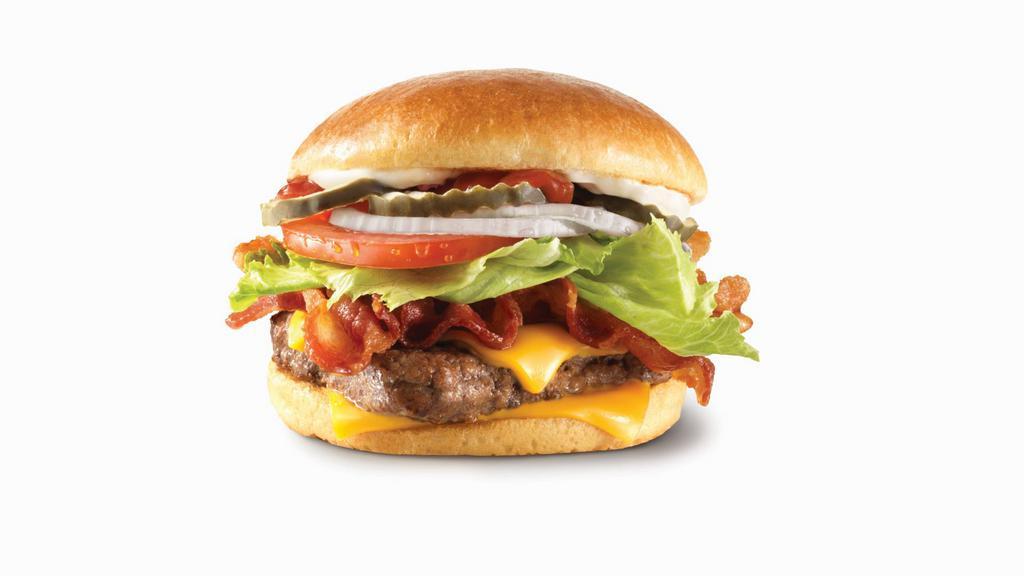 Big Bacon Classic® · A quarter-pound* of fresh beef, Applewood smoked bacon, American cheese, crisp lettuce, tomato, pickle, ketchup, mayo, and onion on a toasted bun. It’s big. It’s classic. It’s got bacon..