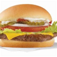 Cheeseburger Deluxe · Fresh, never frozen beef topped with cheese, pickles, onions, tomatoes, crisp lettuce, ketch...