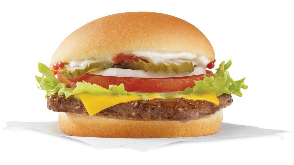 Jr. Cheeseburger Deluxe · Right sized cheeseburger kicked up - Wendy's Junior Cheeseburger Deluxe with 100% fresh North American beef, cheese, pickles, onions, tomatoes and lettuce.
