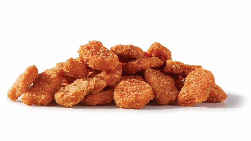 10 Pc. Spicy Chicken Nuggets · 100% white-meat chicken breaded and marinated in our unique, fiery blend of peppers and spices. Served with your choice of six dipping sauces including Buttermilk Ranch, BBQ, Sweet & Sour, Honey Mustard or Ghost Pepper Ranch. The Internet icon is back for a hot minute.