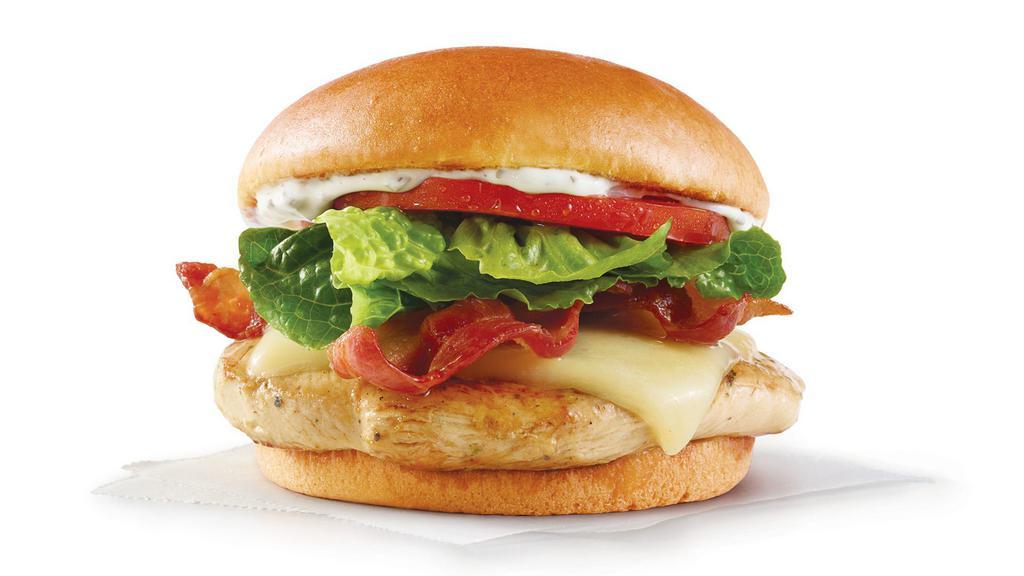 Grilled Asiago Ranch Club · Our chicken is perfectly grilled and topped with crispy bacon, Asiago cheese, creamy ranch, lettuce and tomato – all on a toasted bun. Go grilled. Go home happy.